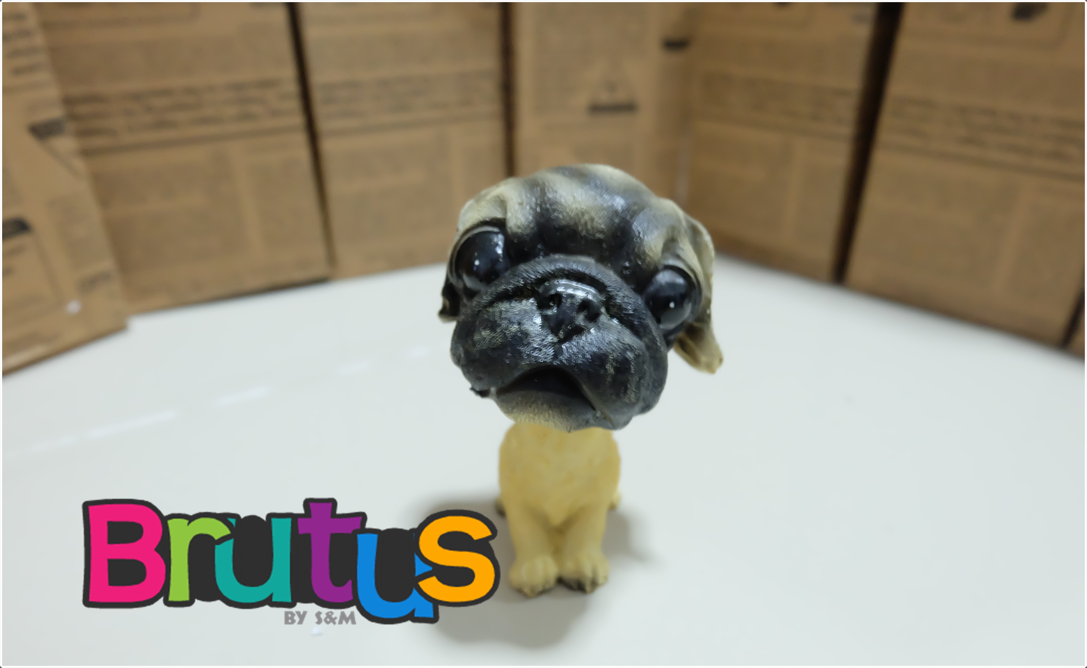 ตุ๊กตาสุนัข เรซิ่น พันธุ์ปั๊กหัวดุ๊กดิ๊ก10cm.