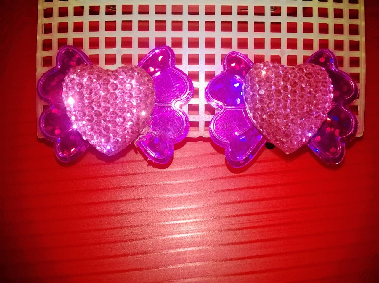 ต่างหูหนีบ(สีชมพูบานเย็น)เป็นรูปหัวใจติดโบว์