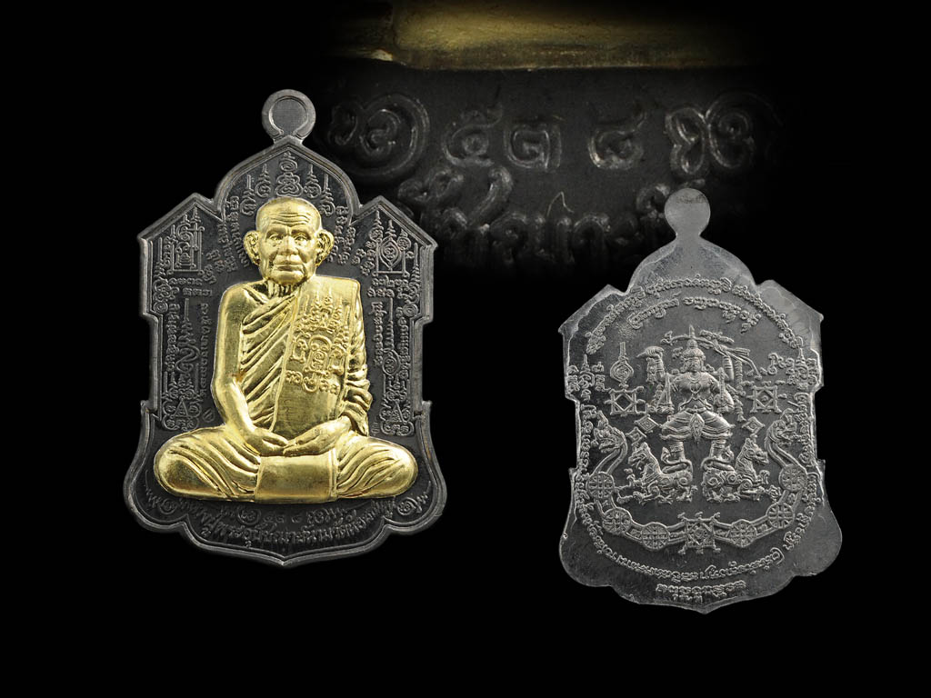 เหรียญจิ๊กโก๋ หลัง นารายณ์พลิกแผ่นดิน หลวงปู่นาม วัดน้อยชมภู่ บ้านกร่าง สุพรรณบุรี รุ่นไตรมาส 53 เนื้อตะกั่วหน้ากากทองทิพย์ หมายเลข ๕๓๘ คัดสวย สภาพสมบูรณ์ตรงตามรูป
