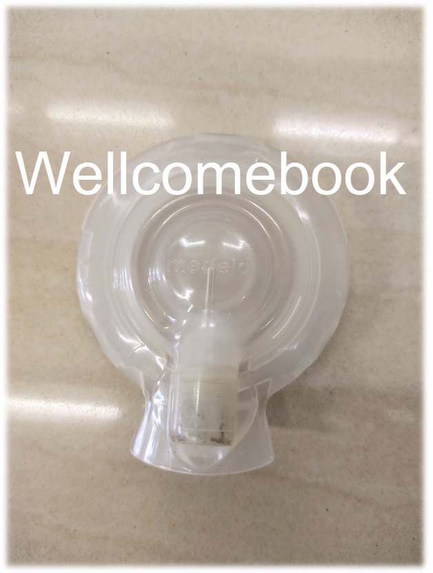 อะไหล่แท้เครื่องปั้มนม Medela รุ่น freestyle "ฝาล็อคกรวยปั้ม" 1 อัน (สินค้ามือสอง)