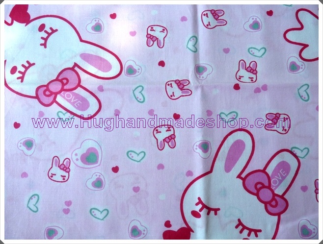 ผ้าคอตตอนสีชมพูลายการ์ตูน