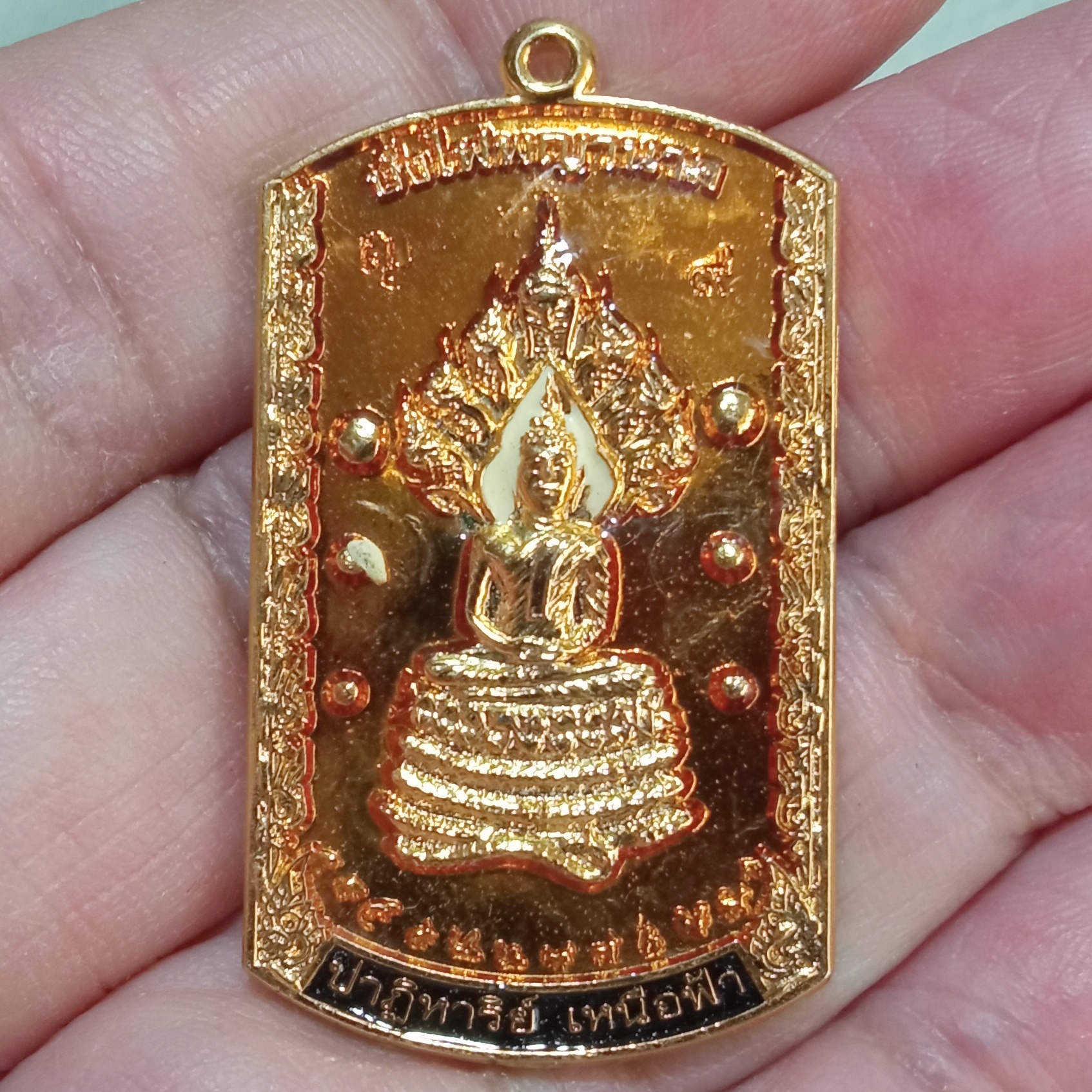 เหรียญอธิฐานตำนานมหัศจรรย์ วัดไทย เมืองบั้งไพพญานาค อ.โพนพิสัย จ.หนองคาย พิมพ์พระนาคปรก ลงยา3 สีหน้า-หลัง(เหลือง,ดำ,ขาว) มาพร้อมกล่องเดิมจากวัด รุ่นนี้สร้างปี 2553 รหัส324