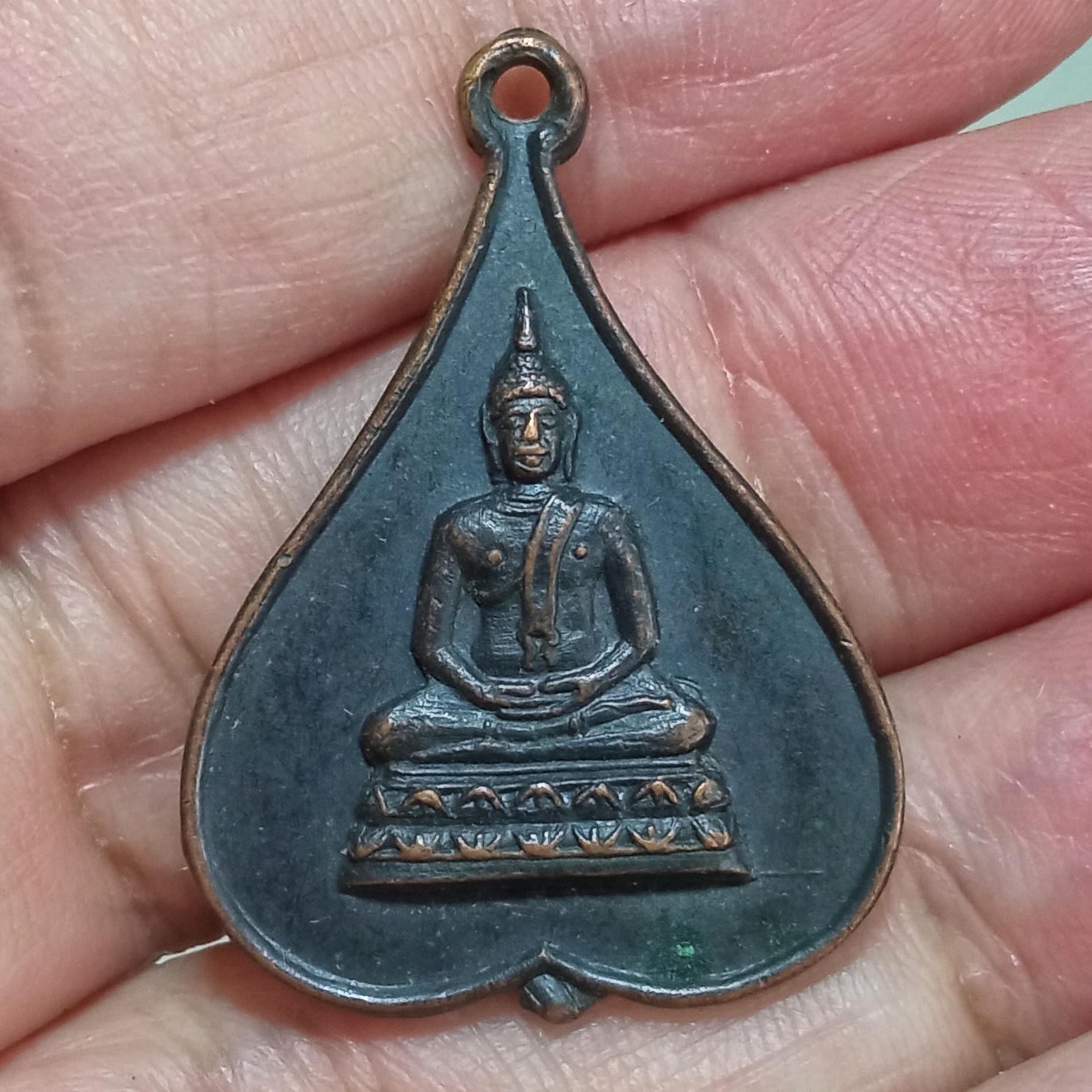 เหรียญพระพุทธ วัดโรงธรรมสามัคคี อ.สันกำแพง จ.เชียงใหม่ ปี 2517 เนื้อทองแดงรมดำ
