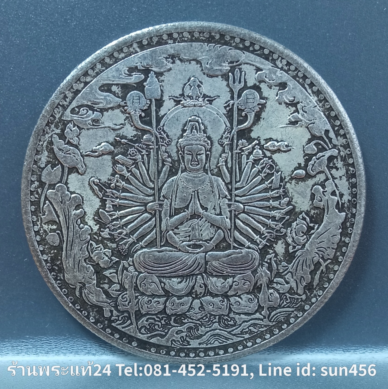 เหรียญพระแม่กวนอิมมหาโพธิสัตว์ปางพันเนตรพันกร เป็นปางหนึ่งของพระมหาโพธิสัตว์อวโลกิเตศวร ขนาด 4.5cm. เนื้อนิเกิ้ล ขอบฟันเฟือง