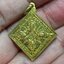 เหรียญข้าวหลามตัด หลวงปู่เทพโลกอุดร วัดเขาใหญ่ หลังพระพรหมสี่หน้า ปี 2562 เนื้อทองเหลือง ตอกโค๊ต