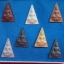 สมเด็จนางพญา สก. ชุดกรรมการ 7องค์7สีบรรจุกล่องเดิมแบบมีขาตั้งบูชา
